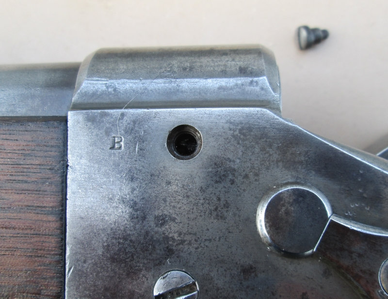 extracteur cassé sur une carabine Remington Rolling-Block Ujbz
