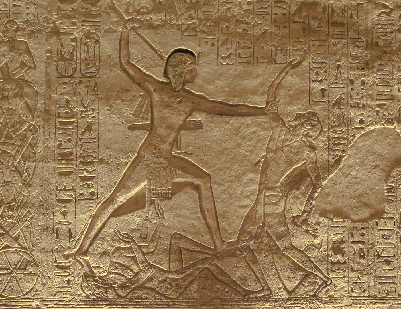 Ramsès II en train de tuer un ennemi tout en en piétinant un autre