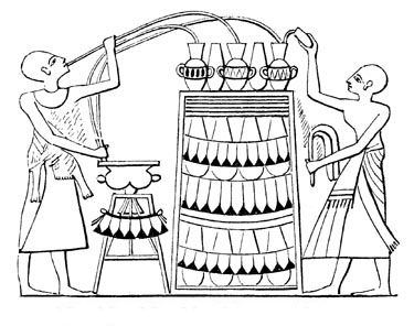 Utilisation du siphon à vin dans l'Egypte ancienne.