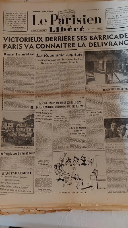 [Maj 21/06]Pile de vieux journaux pour quelques euros sur un stand et ... Ugum