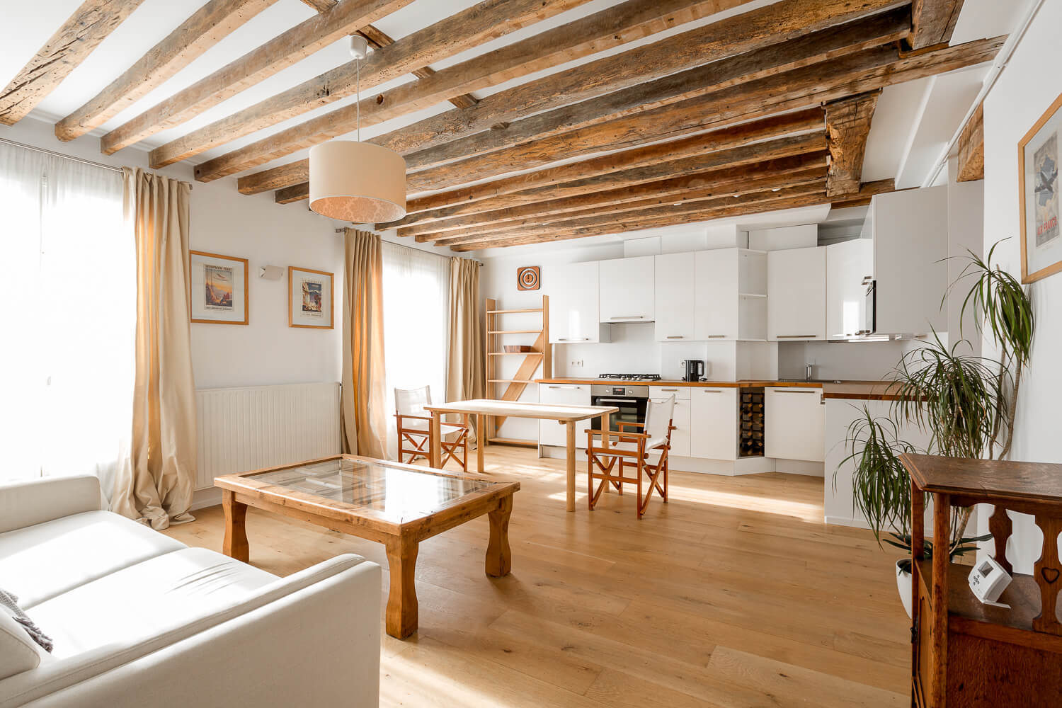 Historical apartment in Le Marais with wooden beams on the ceilings