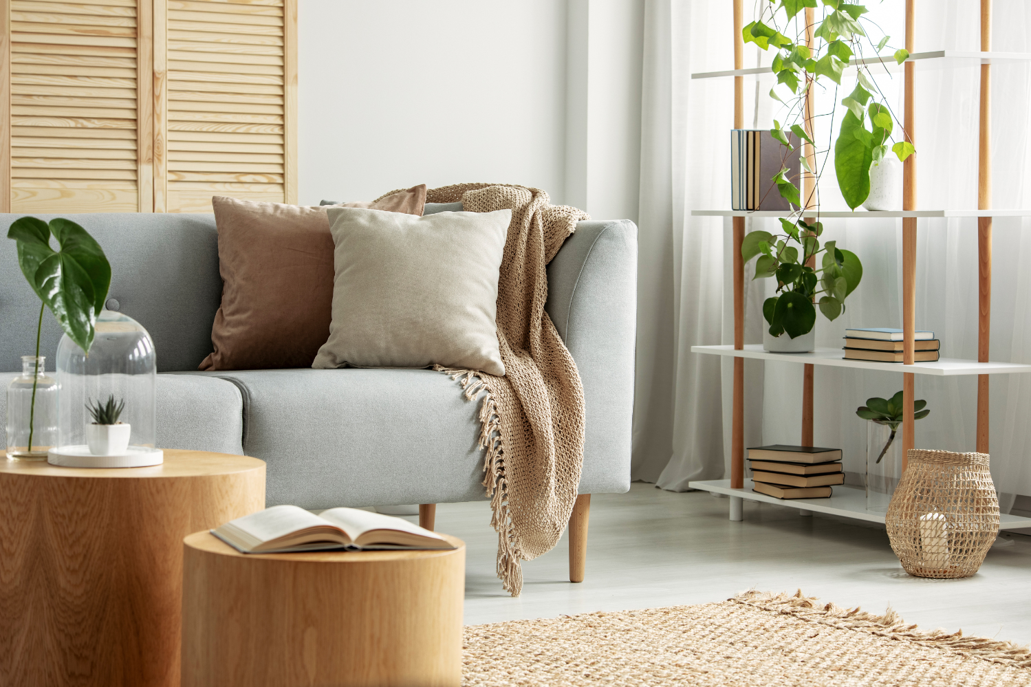 Modern living room with light blue sofa and wooden coffee table