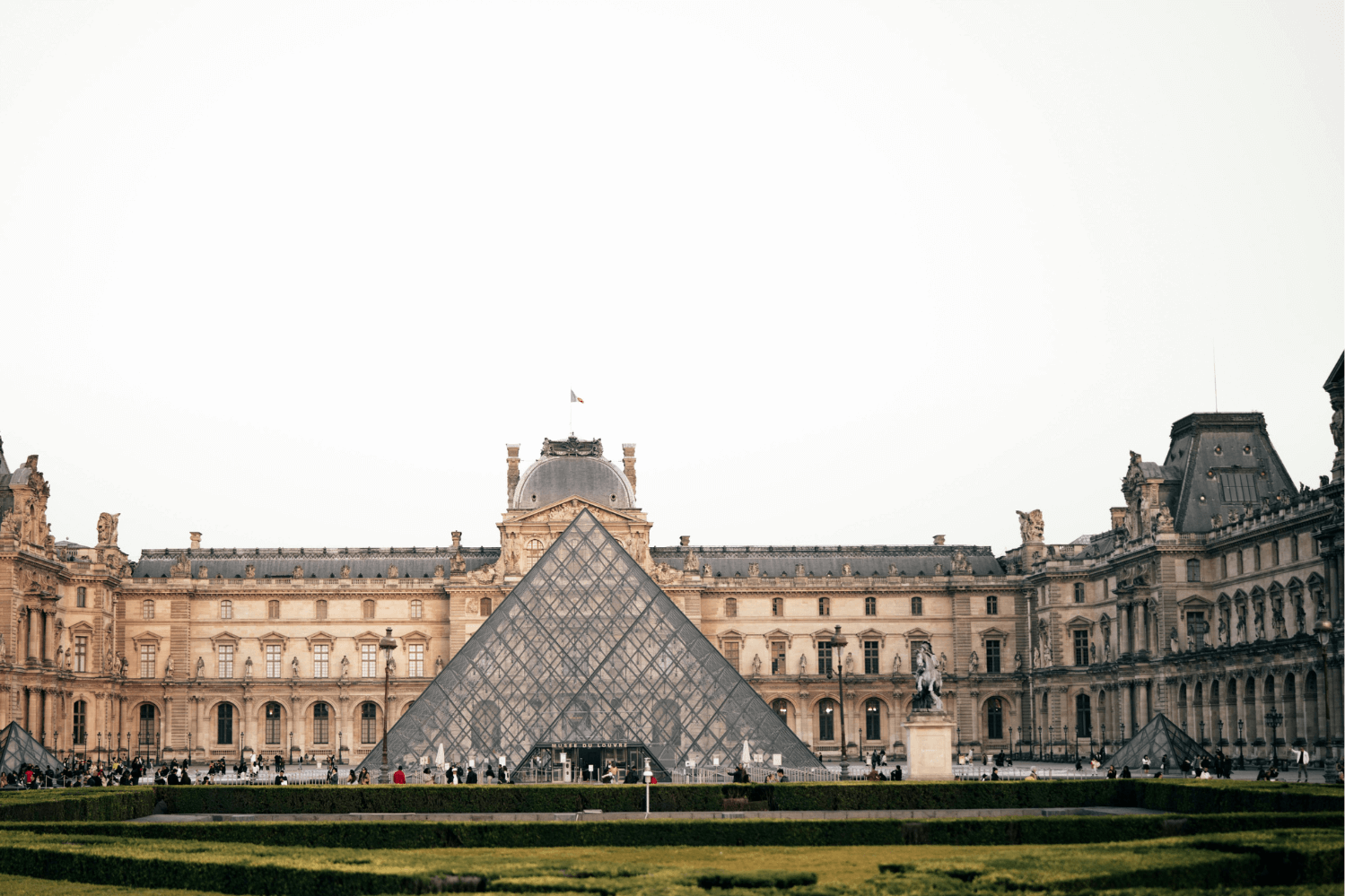 The Louvre Museum in Paris, featuring the iconic glass pyramid and historic palace, home to world-famous masterpieces like the Mona Lisa, and a must-visit cultural landmark in the heart of the city.