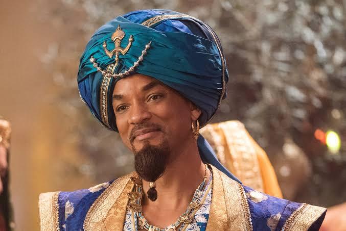 Ibn Sahib, le grand magnat du béton banairais... Ou c'est peut-être l'agent Wilson qui prépare un mauvais tour, qui sait ?//Will Smith dans le rôle du génie dans Aladin. Ibn Sahib, le grand magnat du béton banairais... Ou c'est peut-être l'agent Wilson qui prépare un mauvais tour, qui sait ?//Will Smith dans le rôle du génie dans Aladin.